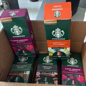 Starbucks Nespresso Pods in Green and Purple Packaging